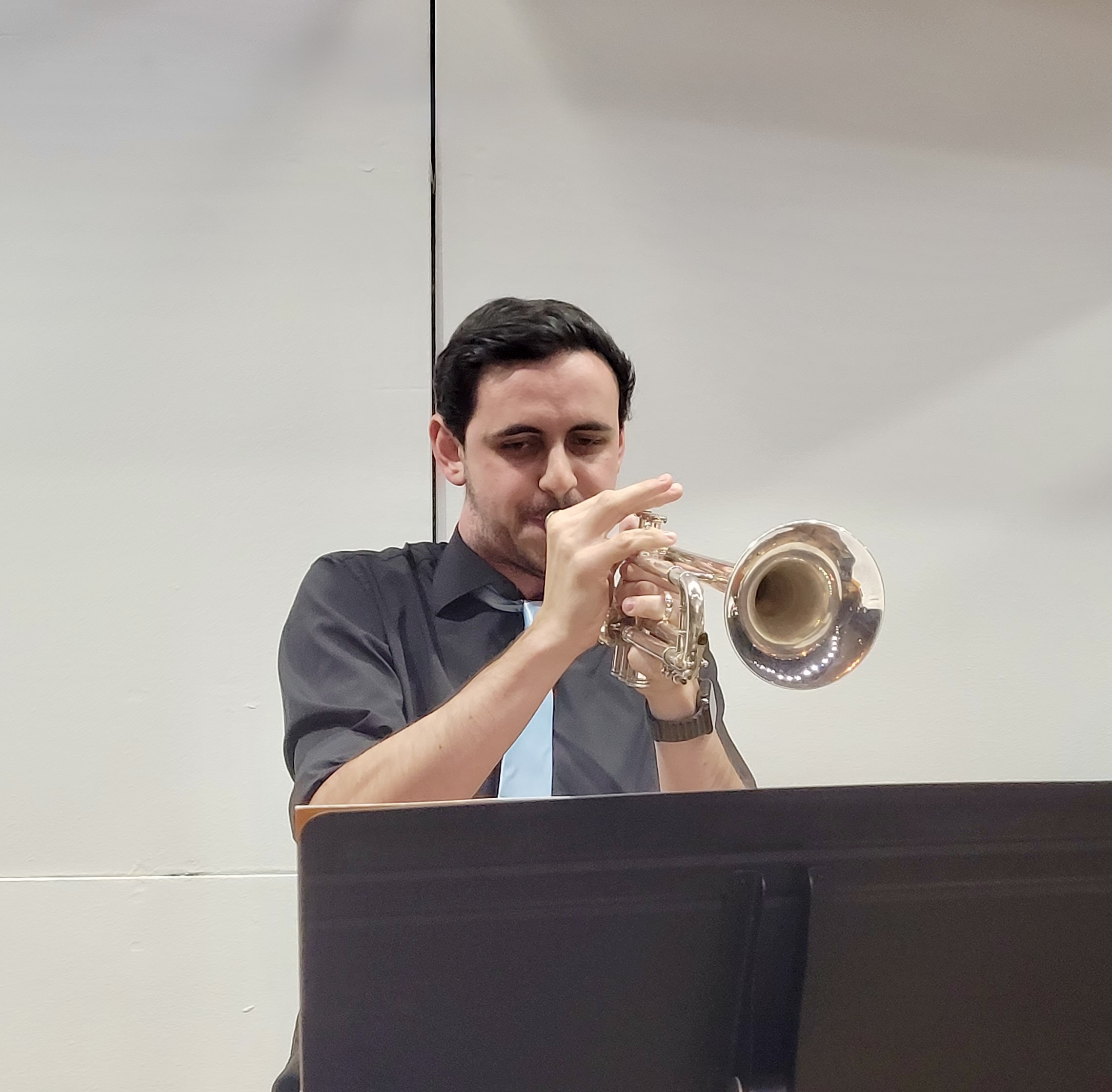 Anthony performing on trumpet